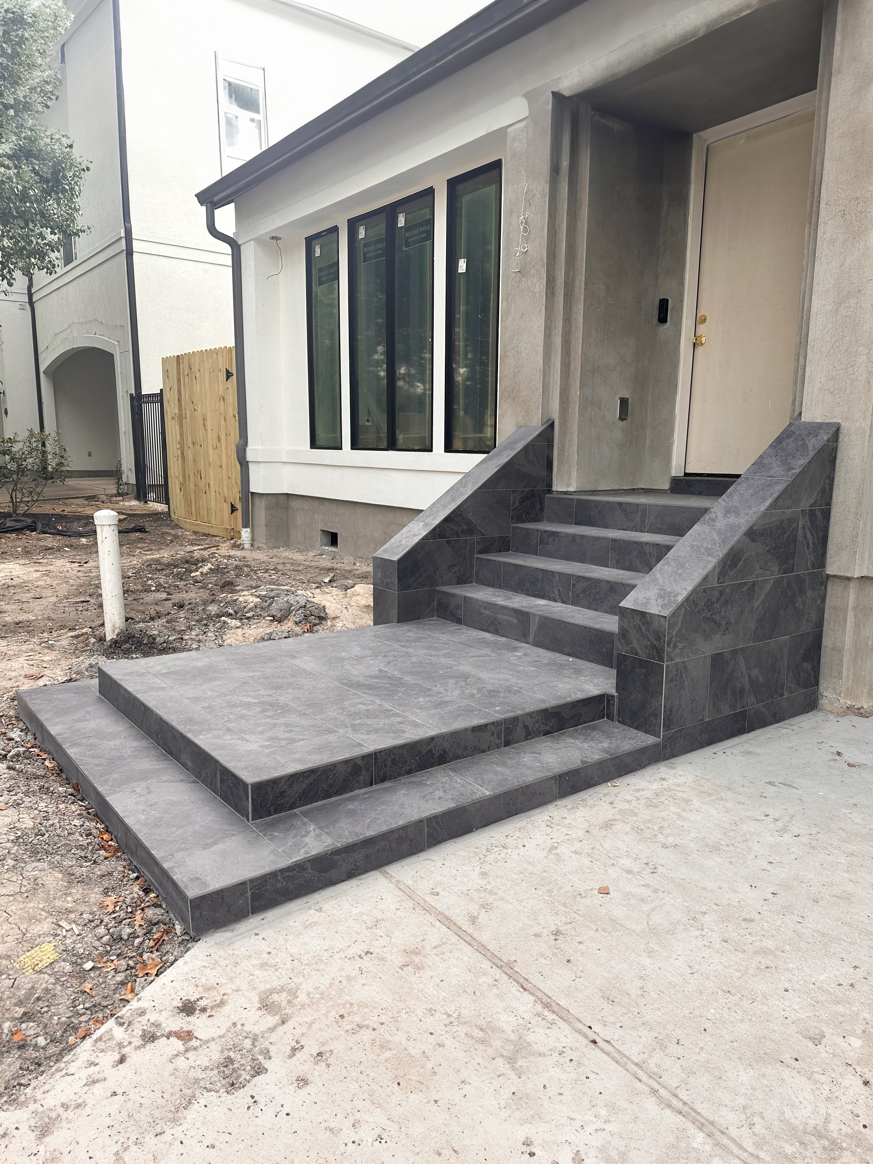 sideview, outdoor tile entryway, wfa's custome hardwood floors, houston texas